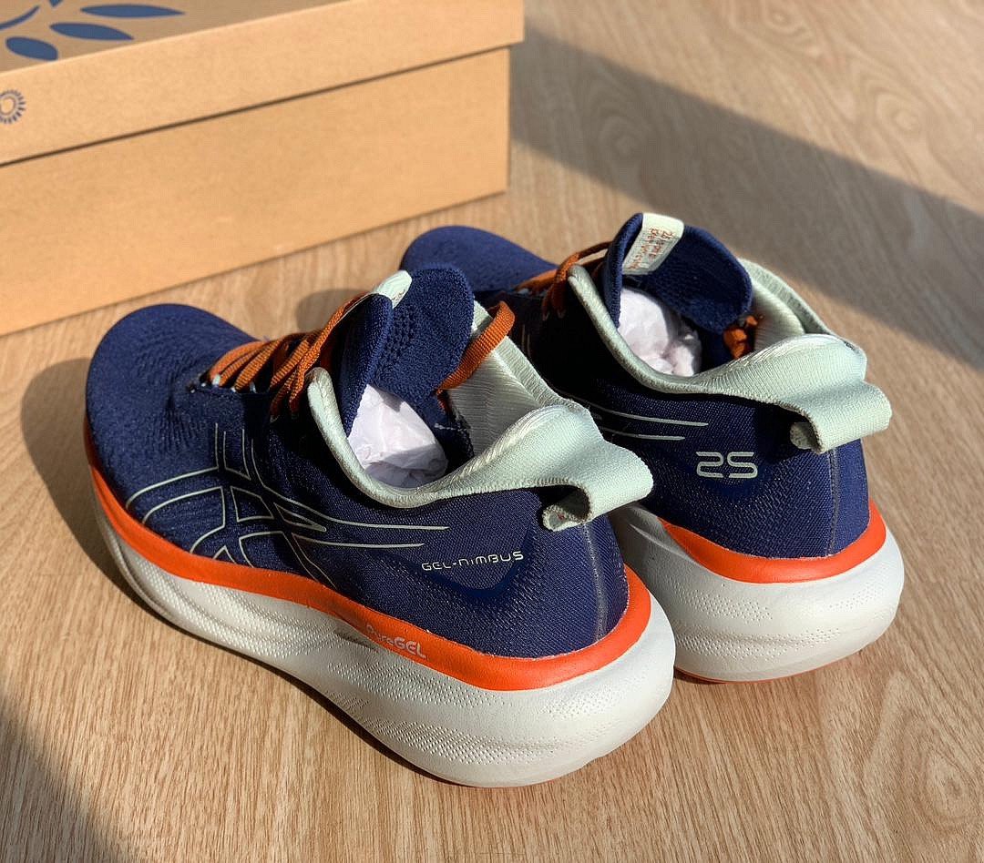 Gel - Nimbus™ 25 Azul Marinho com Laranja e Branco