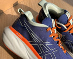 Gel - Nimbus™ 25 Azul Marinho com Laranja e Branco