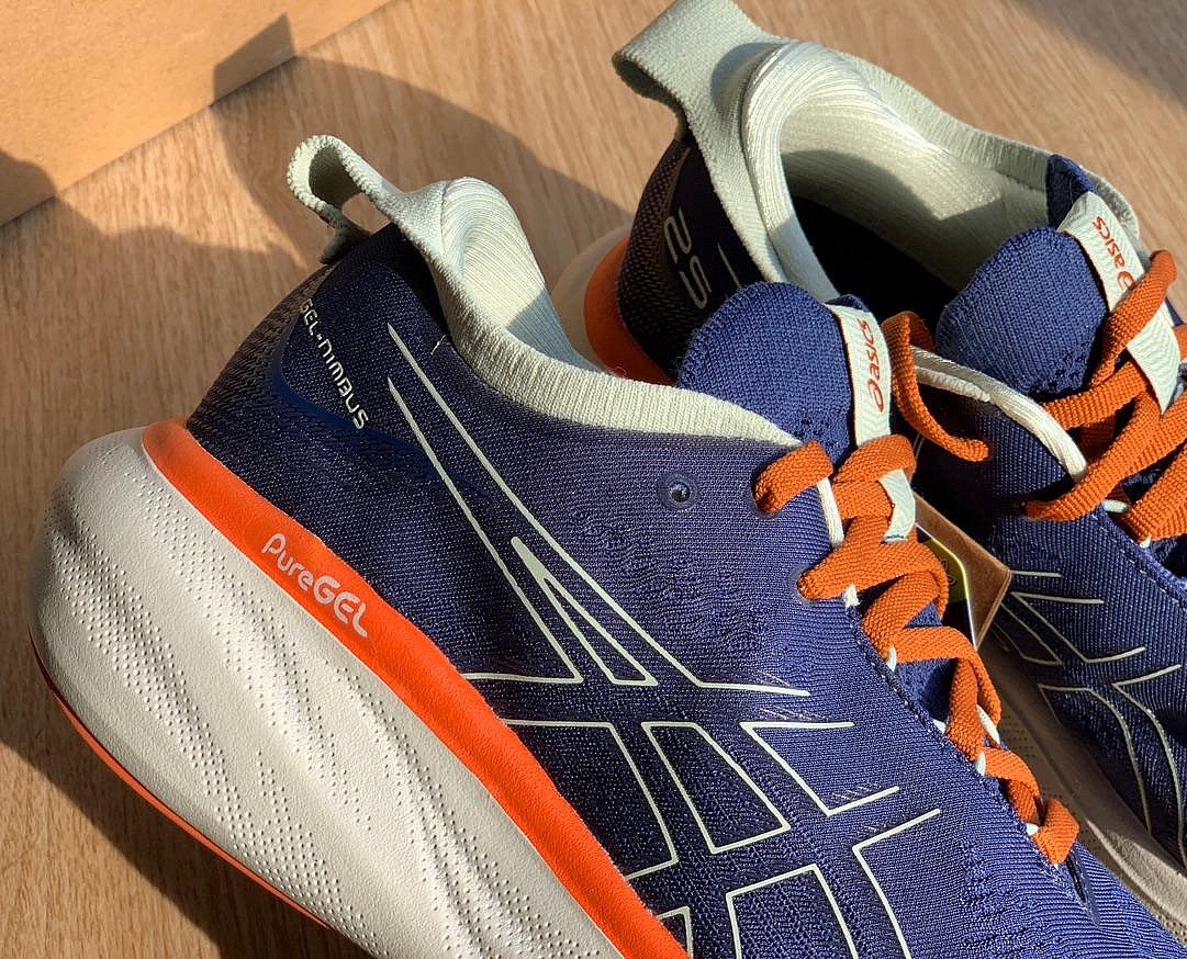 Gel - Nimbus™ 25 Azul Marinho com Laranja e Branco