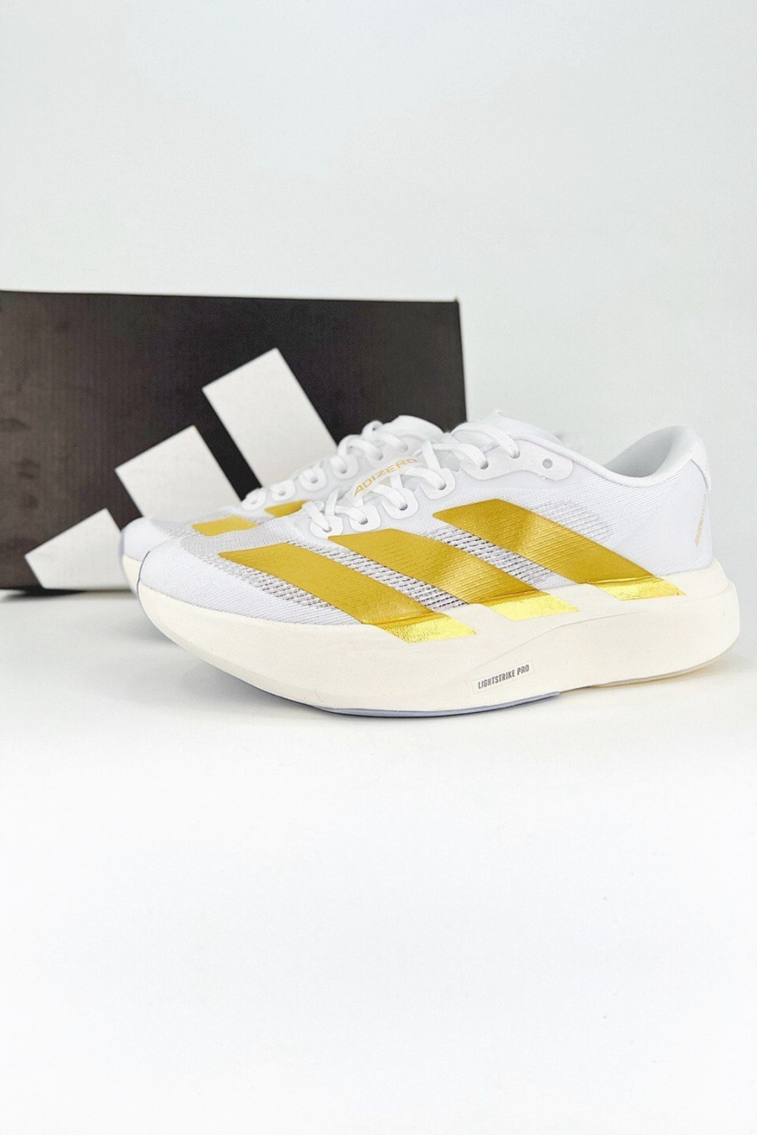 Adizero EVO SL - Branco/Dourado